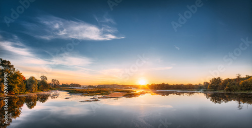 Panorama Of Autumn River Landscape In Europe At Sunrise. Sun Shine