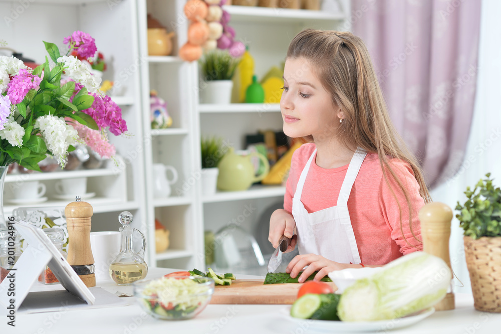 attractive young girl cooking 