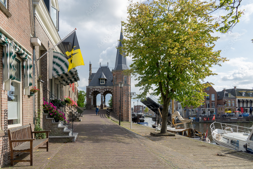 Waterpoort (Water gate) at the Waterpoortsgracht (Water gate canal) at the Geeuwkade in the city of Sneek in the province Friesland, The Netherlands