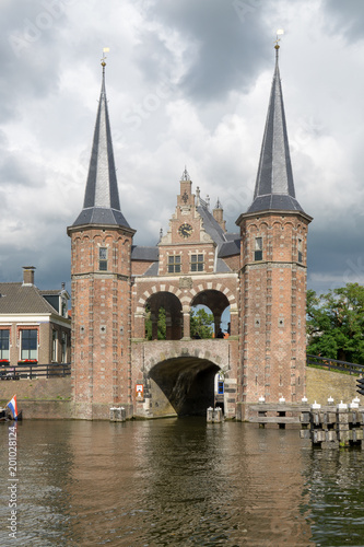 Waterpoort (Water gate) seen from the Lemmerweg in the city of Sneek in the province Friesland, The Netherlands