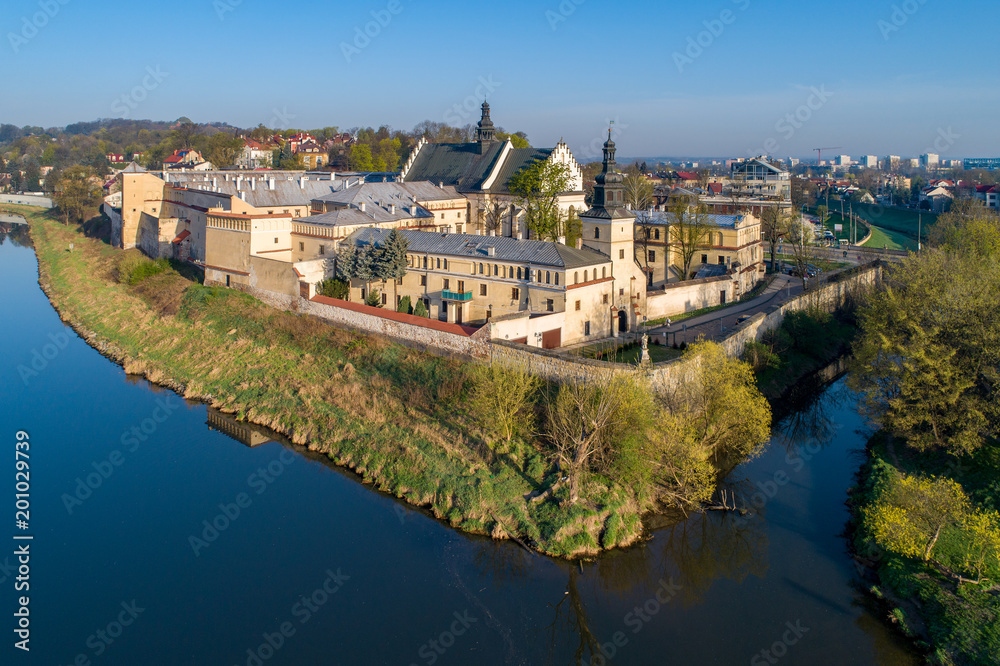 Krakow, Poland. Norbertine female convent, church, Vistula and Rudawa rivers and far view of Kosciuszko Mound. Aerial photo.