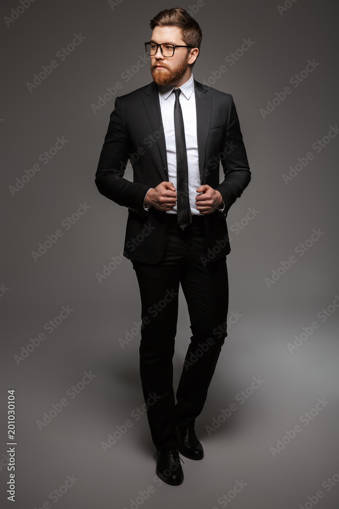 Full length portrait of a confident young businessman Full length portrait of a confident young businessman