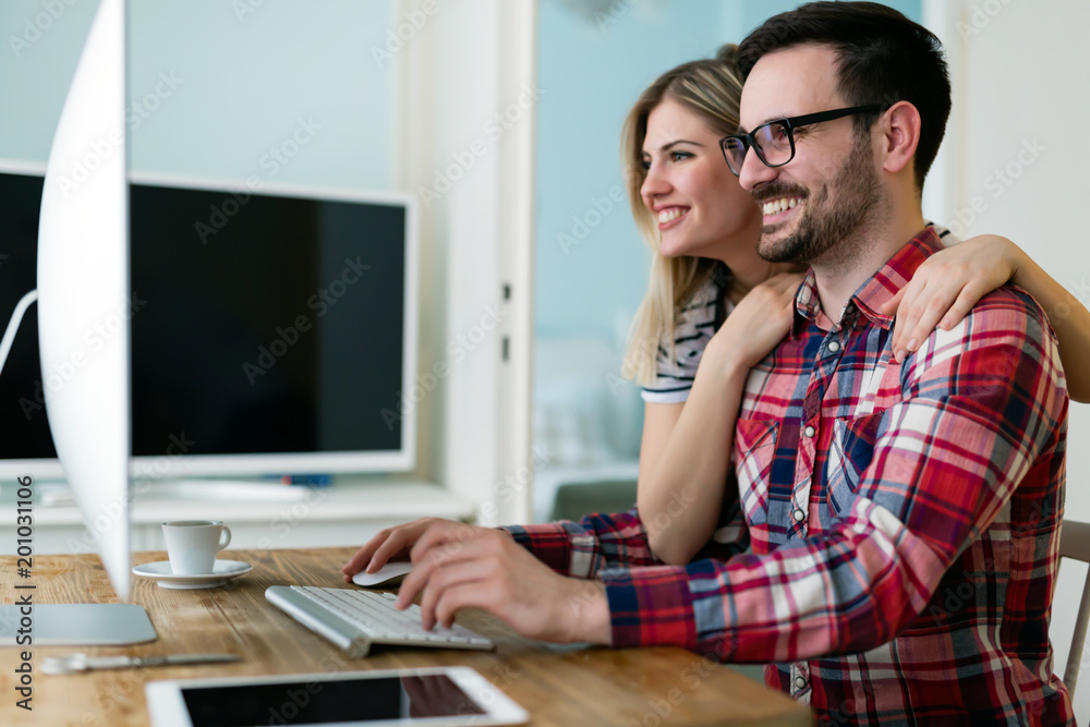 Young attractive designers working together from home Young attractive designers working together from home
