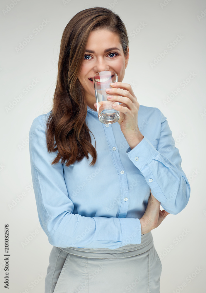 Businesswoman drinking water with glass. Businesswoman drinking water with glass.