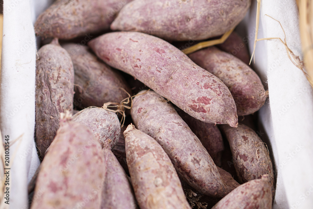 close up purple sweet potato in a basket close up purple sweet potato in a basket