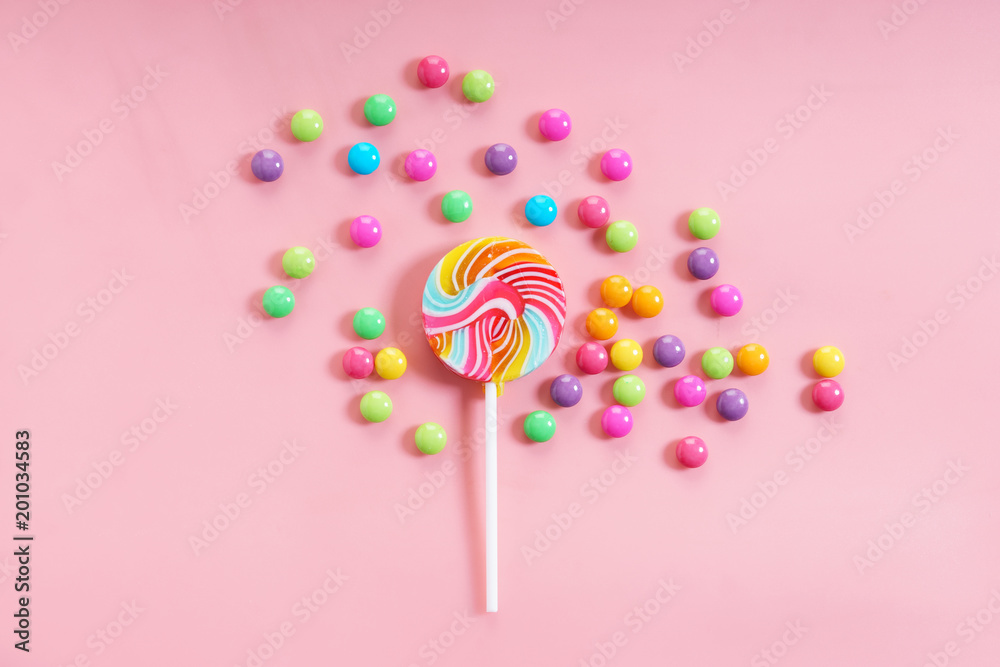 Colorful chocolate candies and lollipop