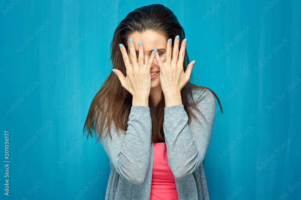 Girl covers face with hands. Girl covers face with hands.