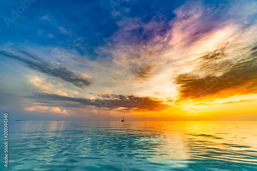 Calm sea ocean blue sky background. Zen background, inspirational sky clouds background. Natural sunset, sea, background horizon, sea sunset view.  © icemanphotos