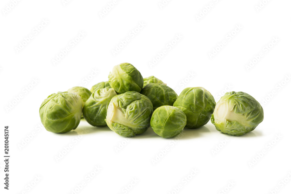 Fototapeta premium Brussels sprouts cabbage isolated on a white. Brussels sprouts cabbage on a white background. Cabbage with copy space for text.