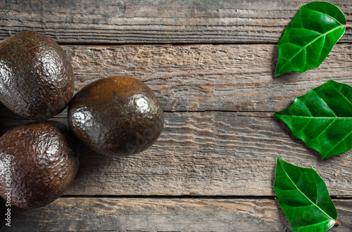Avocado on a wooden background