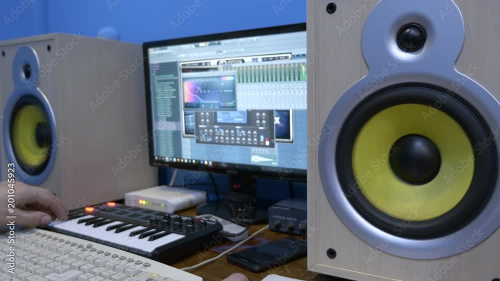 Musician composes track using drum machine. vibration of speakers from loud music. Musician composes track using drum machine. vibration of speakers from loud music.