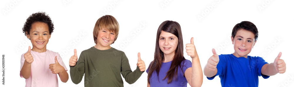 Happy children saying Ok with their thumbs Happy children saying Ok with their thumbs