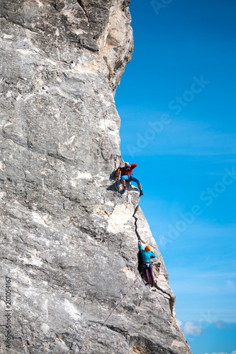 Photographer shoots climbers.