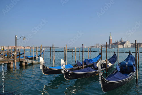 Venice, Italy  March 2018. Gondolas background Basilica St. George