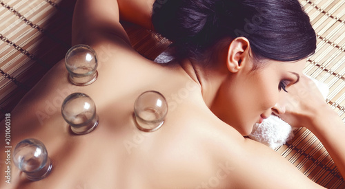 Young and beautiful woman in spa. Health and beauty concept. photo