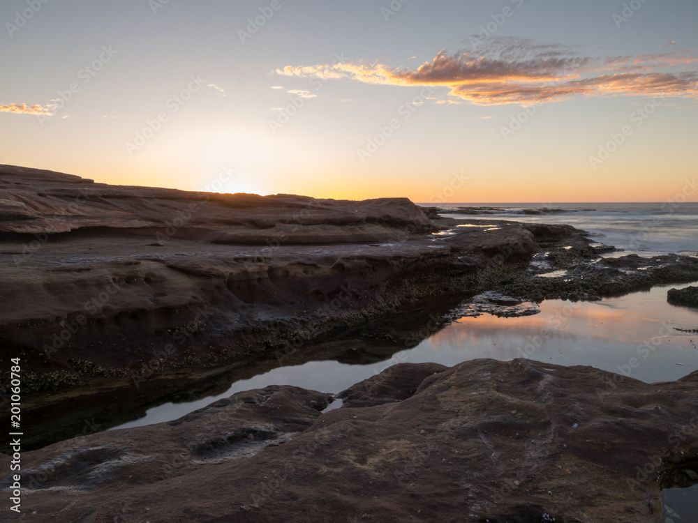Sunset on rocky beach, Red Bluff, Kalbarri, Western Australia