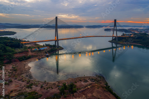 Aerial view of Barelang Bridge a chain of six bridges of various types that connect the islands of Batam at sunrise, Indonesia