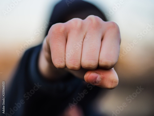 fist directly in focus