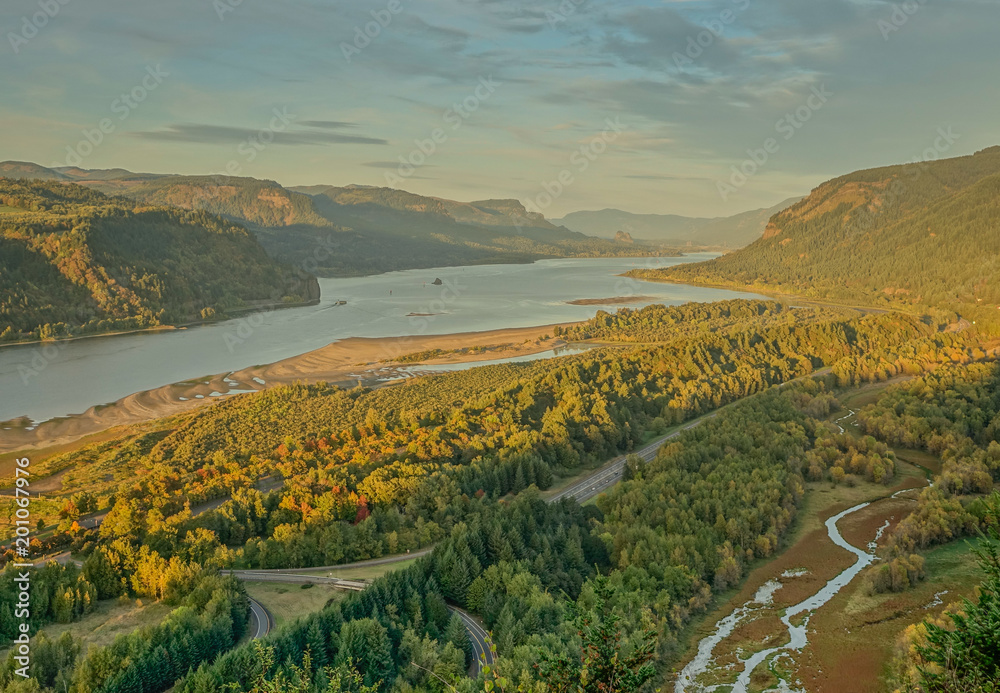 Columbia River Highway, Corbett in Oregon, USA - October 13, 2015: Panoramic view from Crown Point Vista House over the Columbia River Gorge in a sunset