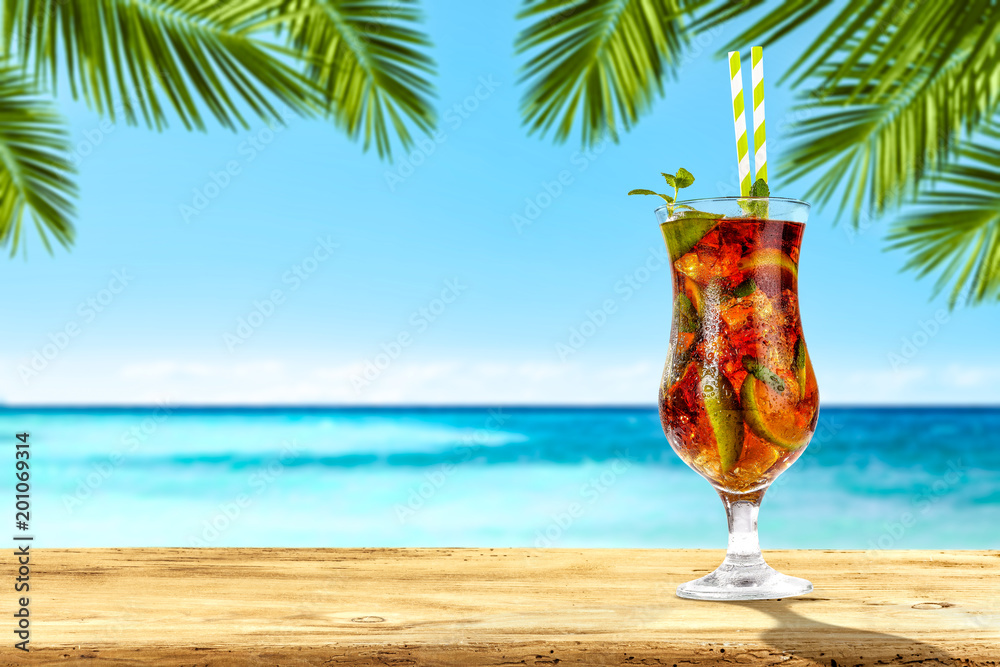 Summer drink on desk and sea landscape 