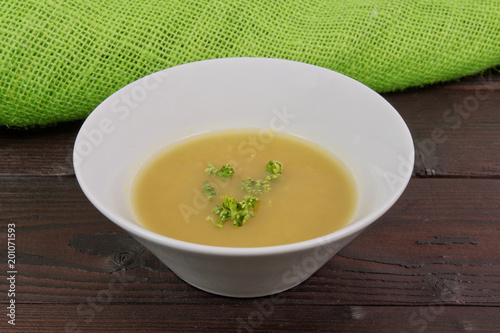 Chickpea soup with vegertables on a table photo