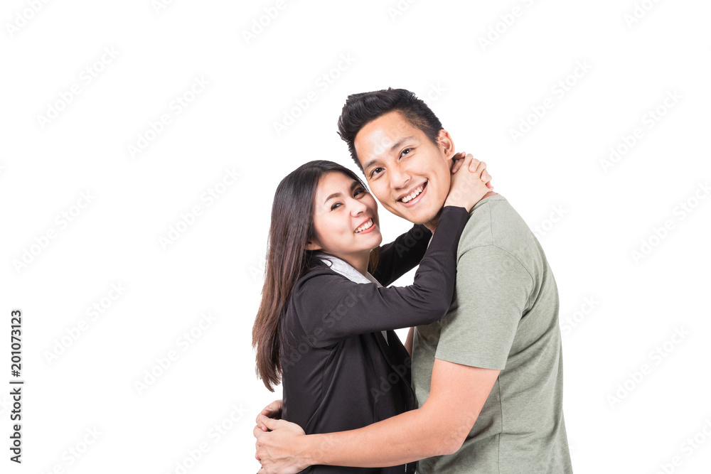 Portrait of young couple smiling on white background. Portrait of young couple smiling on white background.
