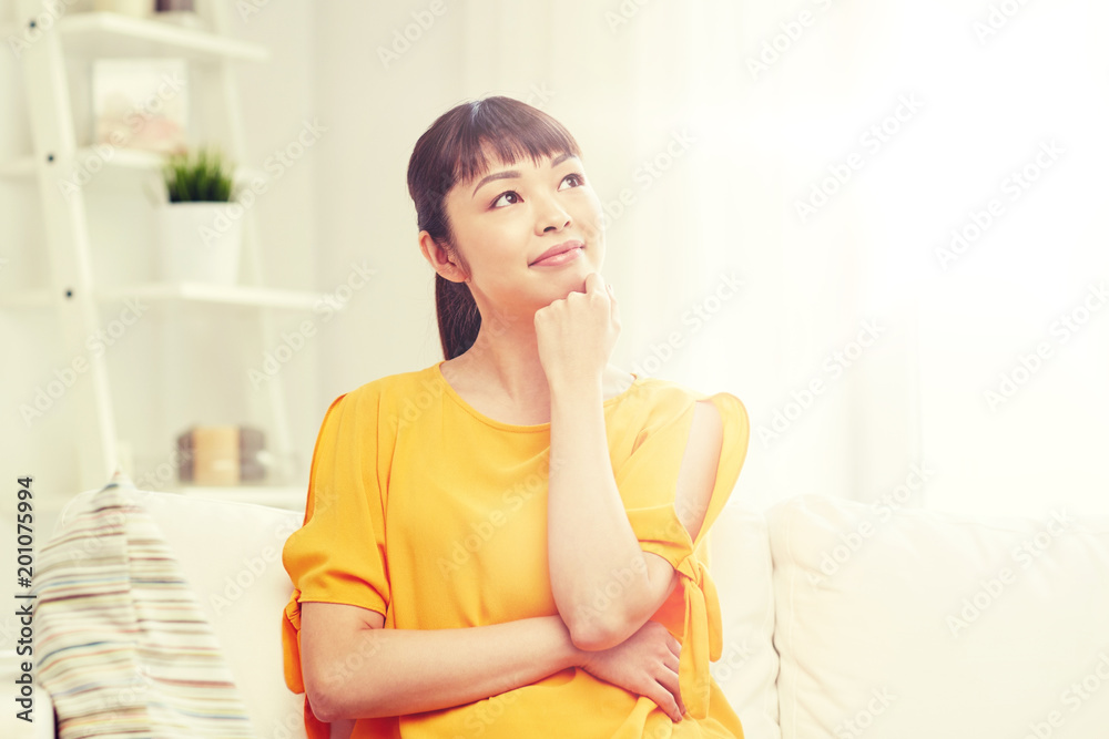 people, race, ethnicity and portrait concept - happy asian young dreaming woman at home people, race, ethnicity and portrait concept - happy asian young dreaming woman at home