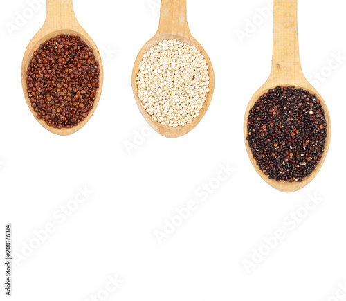 Black red white quinoa seeds in wooden spoon isolated on white background with copy space for your text