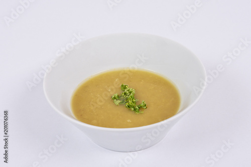 Chickpea soup with vegertables on a white © NERYX