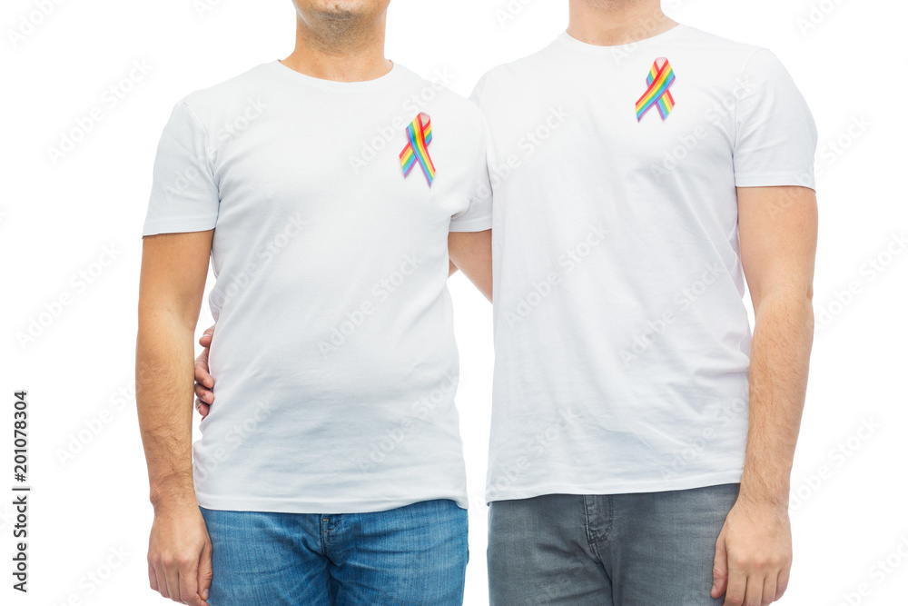 Fototapeta premium lgbt, same-sex relationships and homosexual concept - close up of male couple with gay pride rainbow awareness ribbons