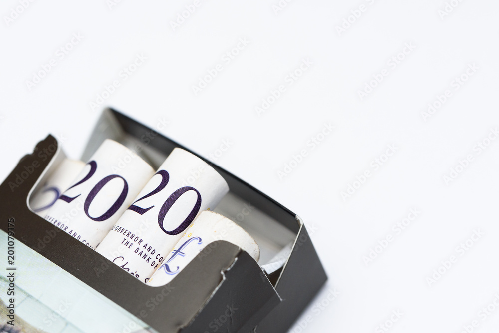 Pack of cigarettes with british £20 Bank Notes