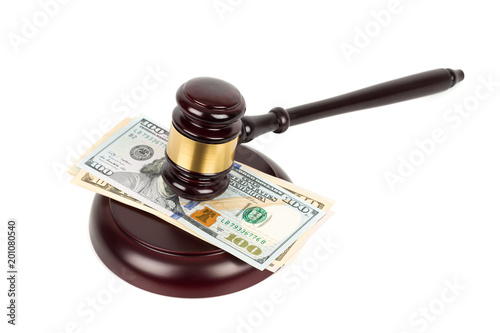 Wooden judge gavel and dollar money banknote on white background