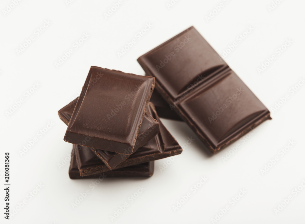 Bar of dark chocolate isolated on white Bar of dark chocolate isolated on white