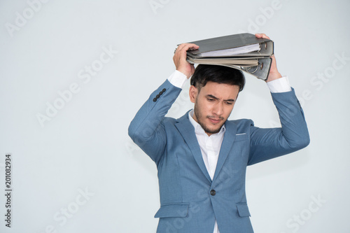 Angry businessman throwing his file, Upset stressed man