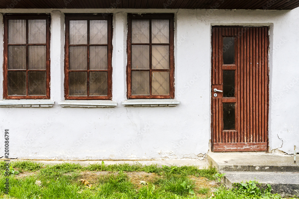 Three windows and a door Three windows and a door