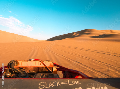 Huacahina dunes at sunset, Perú. Amazing views over a buggy. photo