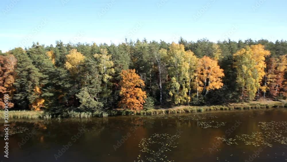 flight over lake and forest at autumn
flight over lake and forest at autumn