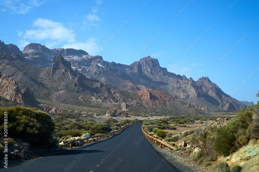 The road between volcanic lava. Textured sandstone