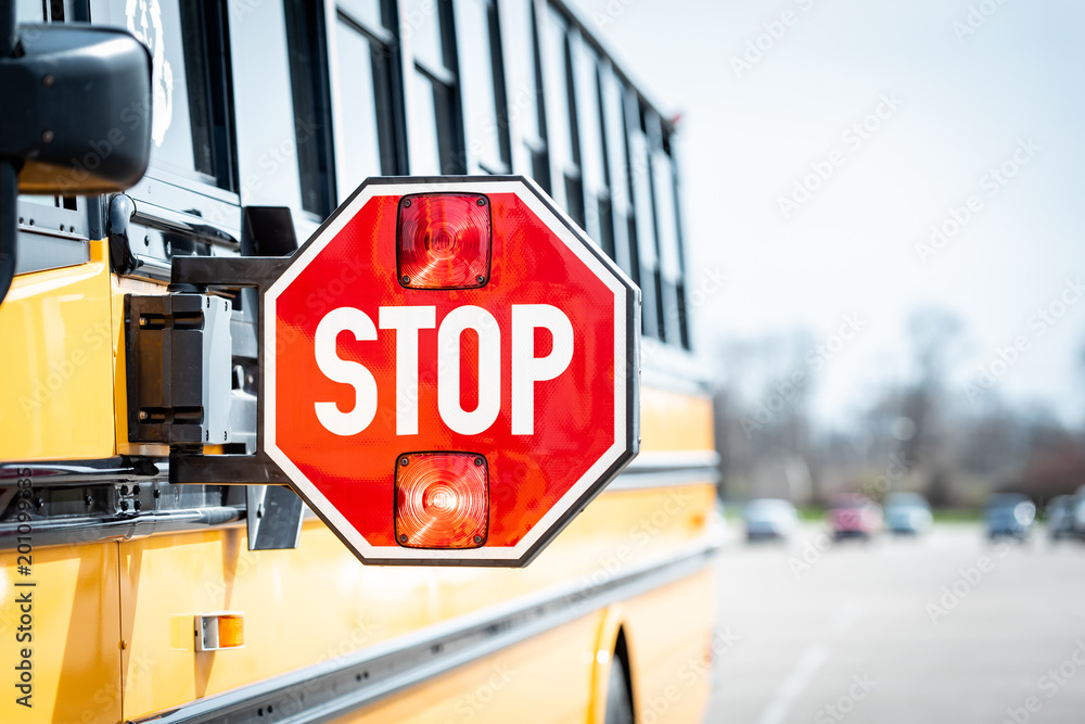 School bus stop sign with flashing lights - obrazy, fototapety, plakaty 