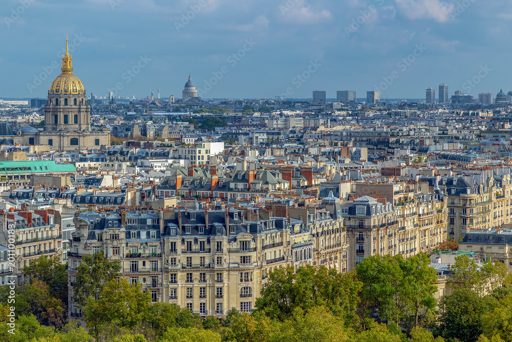 Aerial view of Paris, France, with buildings, roofs and Dome des Invalides