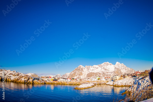 View of Henningsvaer village on the coast at Lofoten photo