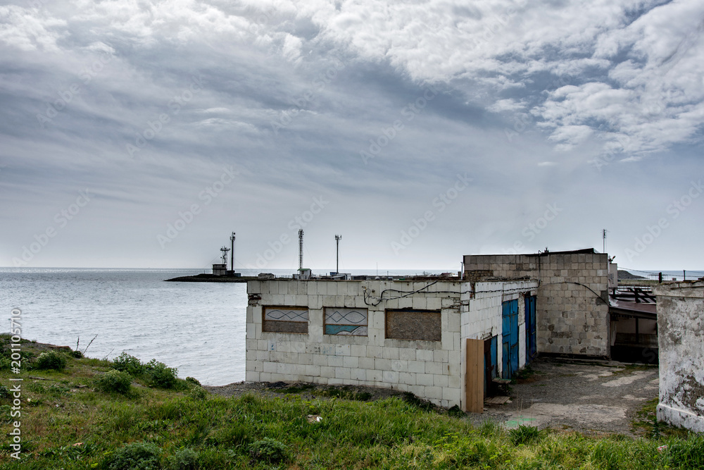 buildings by the sea Bay where the lighthouse is located buildings by the sea Bay where the lighthouse is located