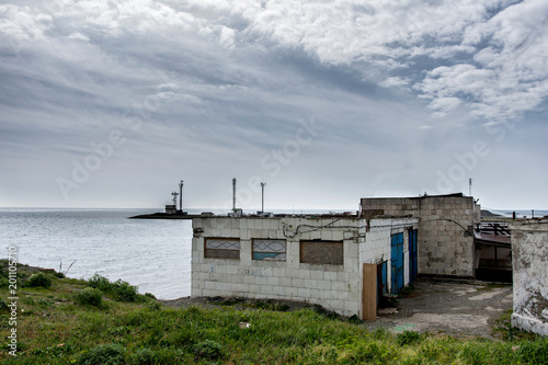 buildings by the sea Bay where the lighthouse is located