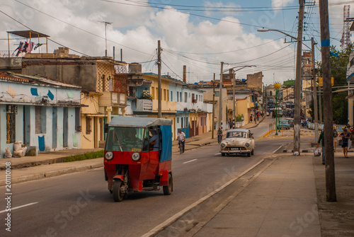 Photography Santa Clara, Cuba: Taxi-motorcycle to transport people in Cuba.