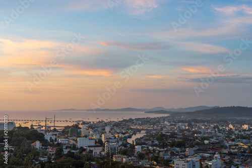 DUONG DONG, PHU QUOC, VIETNAM - NOVEMBER 21, 2017: Beautiful view from the high on town, sea, bay and hills at sunset