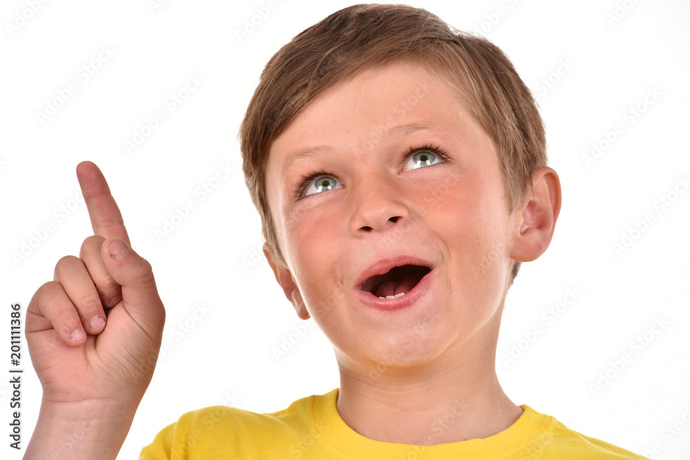 Happy boy. Emotional child. Studio pictures of a teenager.