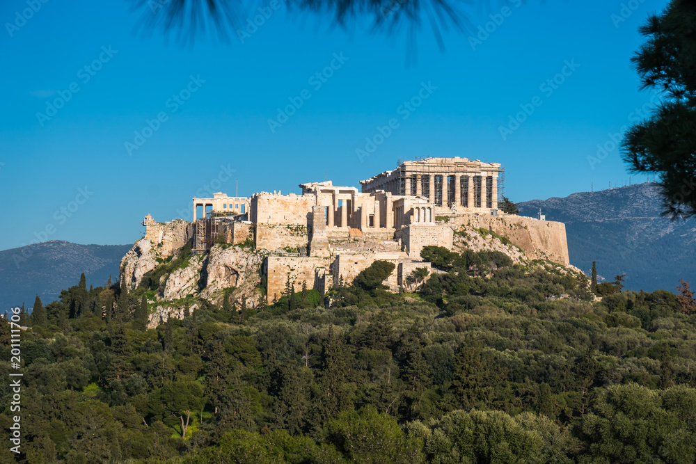The Parthenon Temple at the Acropolis of Athens during colorful sunset, Greece The Parthenon Temple at the Acropolis of Athens during colorful sunset, Greece