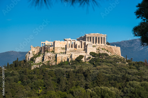The Parthenon Temple at the Acropolis of Athens during colorful sunset, Greece