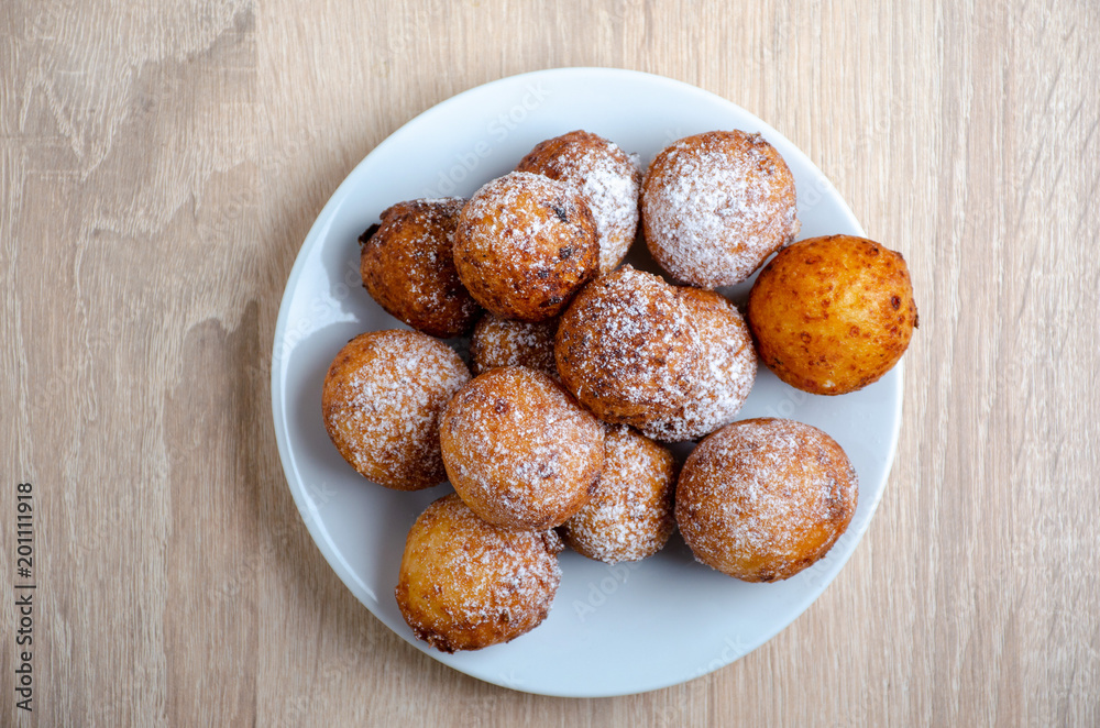 Curd cheese doughnuts on wooden background. Top view. Curd cheese doughnuts on wooden background. Top view.