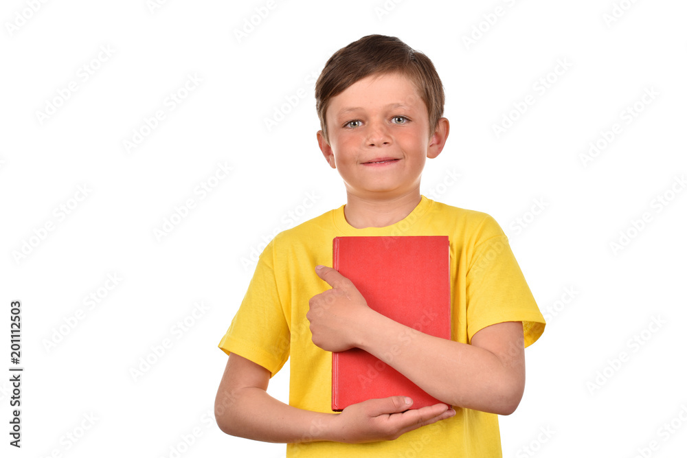 A schoolboy with a book. Emotional boy on a white background. Portrait of a teenager. A schoolboy with a book. Emotional boy on a white background. Portrait of a teenager.